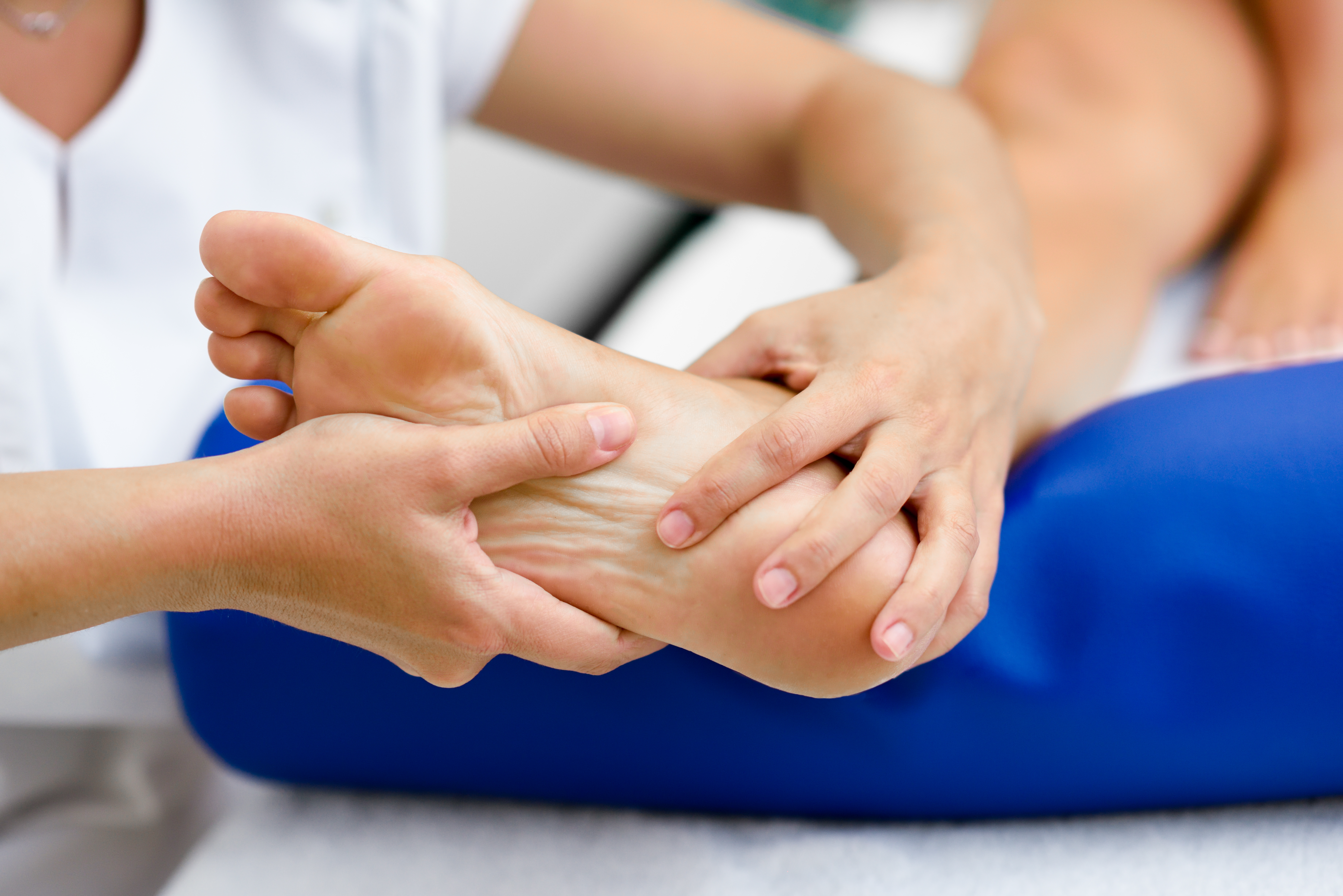 Podiatrist consulting with a patient